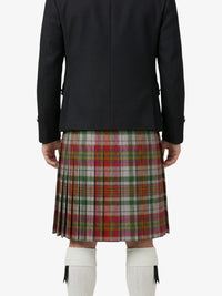 Person wearing a dark jacket and plaid kilt on a white background