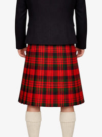 Person wearing a red plaid kilt with a black jacket on a white background
