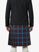 Person wearing a black jacket and a red, blue, and green plaid kilt on a white background