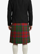 Person wearing a black jacket and red plaid kilt on a white background