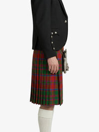 Person wearing a black jacket and red plaid kilt on a white background