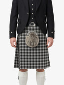 Person wearing a traditional Scottish kilt with a visible sporran on a white background