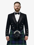 Man wearing a formal prince charlie black suit with a white shirt, bow tie, and a mackenzie tartan kilt on a white background