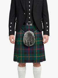 Person wearing a black jacket and tartan kilt with a sporran on a white background