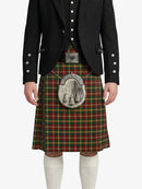 Person wearing a black jacket and red plaid kilt with a silver emblem on a white background