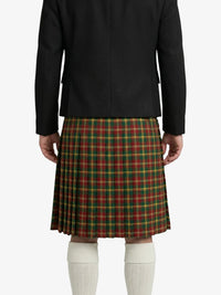 Person wearing a black jacket and red plaid kilt on a white background