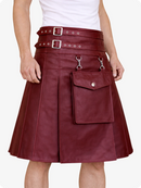 Maroon leather kilt with silver buckles on a white background