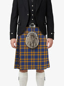 Person wearing a traditional Scottish kilt with a plaid pattern on a white background