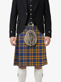 Person wearing a traditional Scottish kilt with a plaid pattern on a white background
