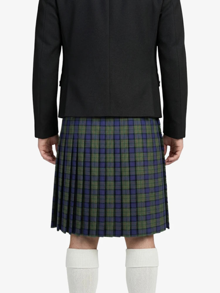 Person wearing a black jacket and plaid kilt on a white background