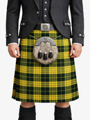 Person wearing a yellow and green plaid kilt with a gray jacket on a white background