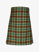 Plaid kilt with green, red, and beige pattern on a white background