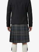 Person wearing a black jacket and plaid kilt on a white background