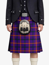 Person wearing a purple plaid kilt with a black jacket on a white background
