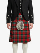 Person wearing a black jacket and red plaid kilt on a white background