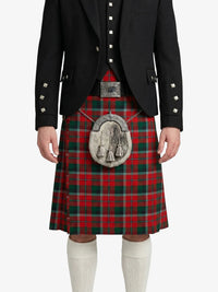 Person wearing a black jacket and red plaid kilt on a white background