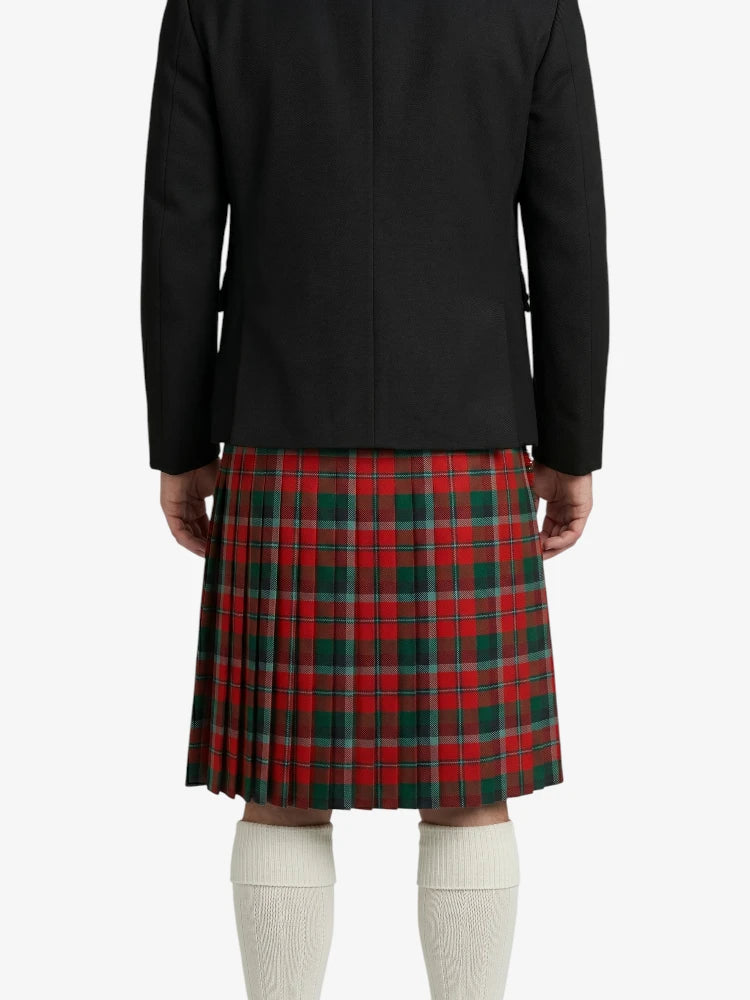 Person wearing a black coat and red plaid skirt on a white background