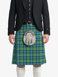 Person wearing a black jacket and green plaid kilt with a silver sporran on a white background