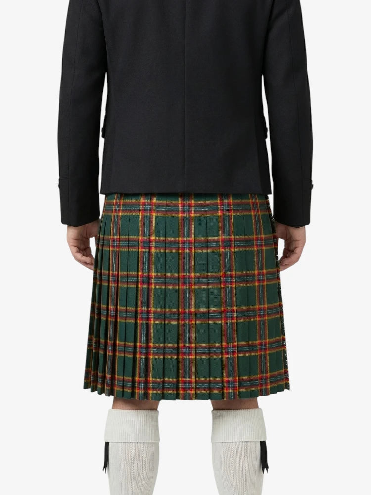 Person wearing a green plaid kilt with a black jacket on a white background