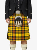 Person wearing a traditional Scottish kilt with a sporran on a white background