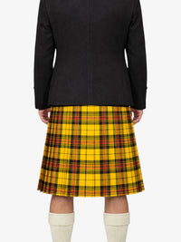 Person wearing a black jacket and yellow plaid kilt on a white background