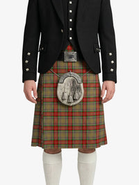 Person wearing a traditional Scottish kilt with a tartan pattern on a white background