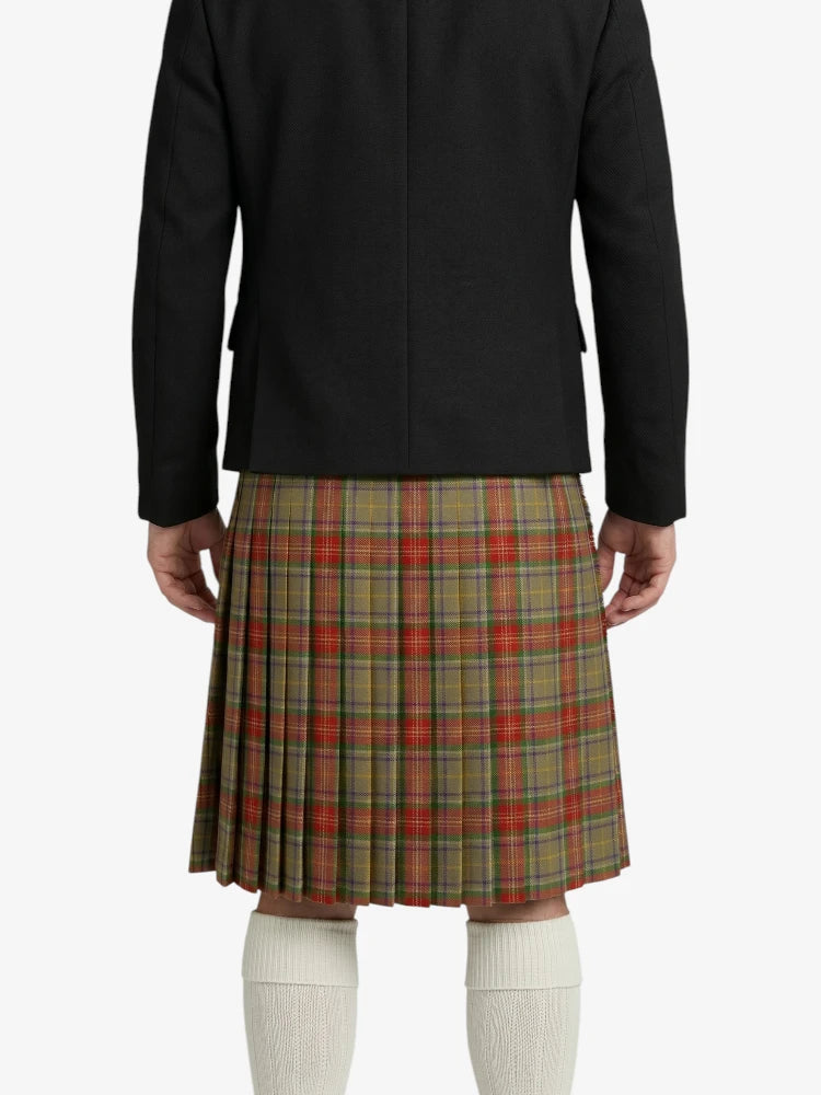 Person wearing a black jacket and plaid kilts on a white background