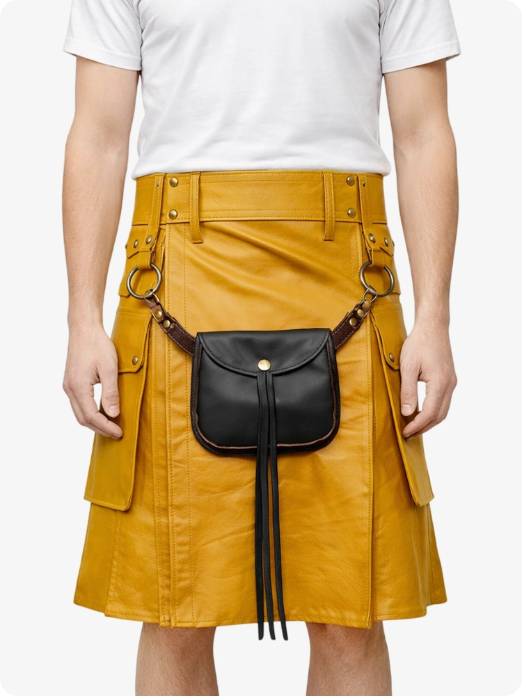 Person wearing a mustard yellow skirt with a black bag over the shoulder on a white background