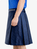 Navy blue pleated skirt worn by a person on a white background