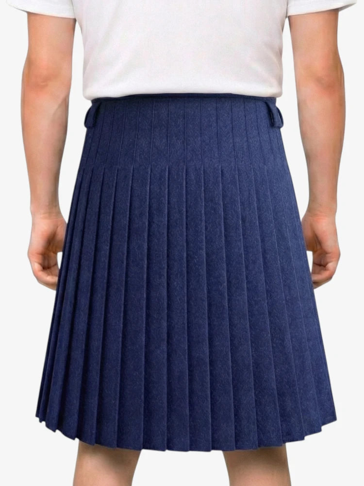 Navy pleated skirt worn by a person on a white background