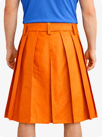 Orange pleated skirt worn by a person on a white background