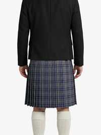 Person wearing a black jacket and plaid kilt on a white background