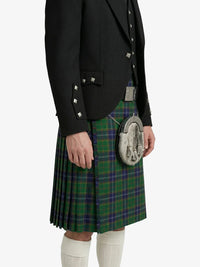 Person wearing a black jacket and green plaid kilt with a sporran on a white background