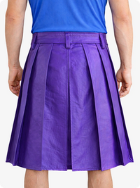 Person wearing a blue top and purple pleated skirt on a white background