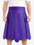 Purple pleated skirt worn by a person on a white background