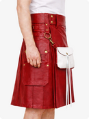 Red leather skirt with gold buttons and a white handbag on a white background