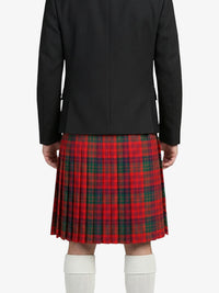 Person wearing a black jacket and red plaid kilt on a white background