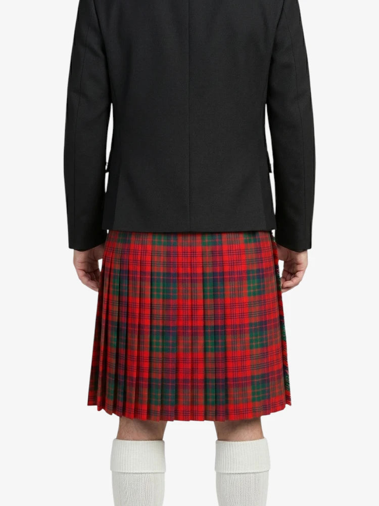 Person wearing a black jacket and red plaid kilt on a white background