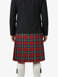 Person wearing a black jacket and red plaid kilt on a white background