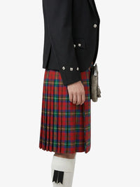 Person wearing a black jacket and red plaid kilt on a white background