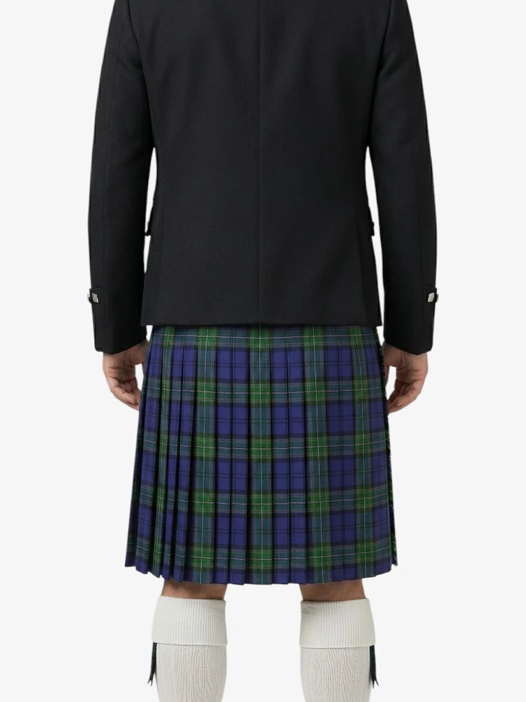 Person wearing a black jacket and blue plaid kilt on a white background