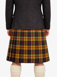 Person wearing a dark gray jacket and plaid kilt on a white background