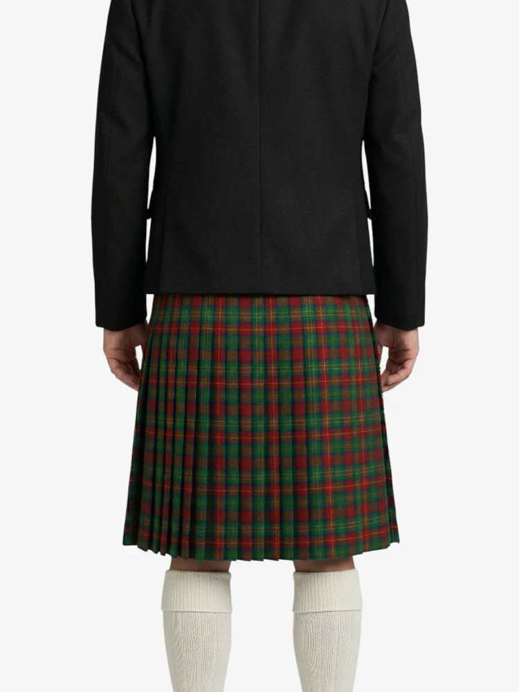 Person wearing a black jacket and red plaid kilt on a white background