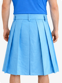 Person wearing a SKy blue pleated skirt and blue top on a white background