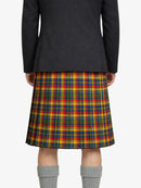 Person wearing a black coat and colorful plaid skirt on a white background