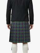 Person wearing a black jacket and green plaid kilt on a white background