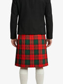 Person wearing a black jacket and red plaid kilt on a white background
