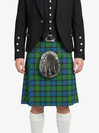 Person wearing a black jacket and green plaid kilt with a silver sporran on a white background