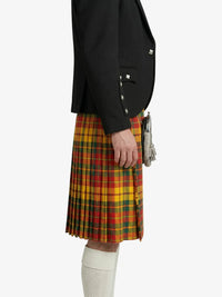 Person wearing a black jacket and red plaid kilt on a white background