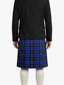 Person wearing a black jacket and blue plaid kilt on a white background